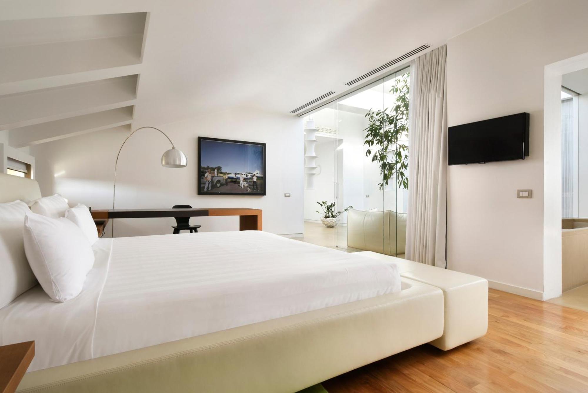 Palazzo Montemartini Rome, A Radisson Collection Hotel Exterior foto A room at the hotel