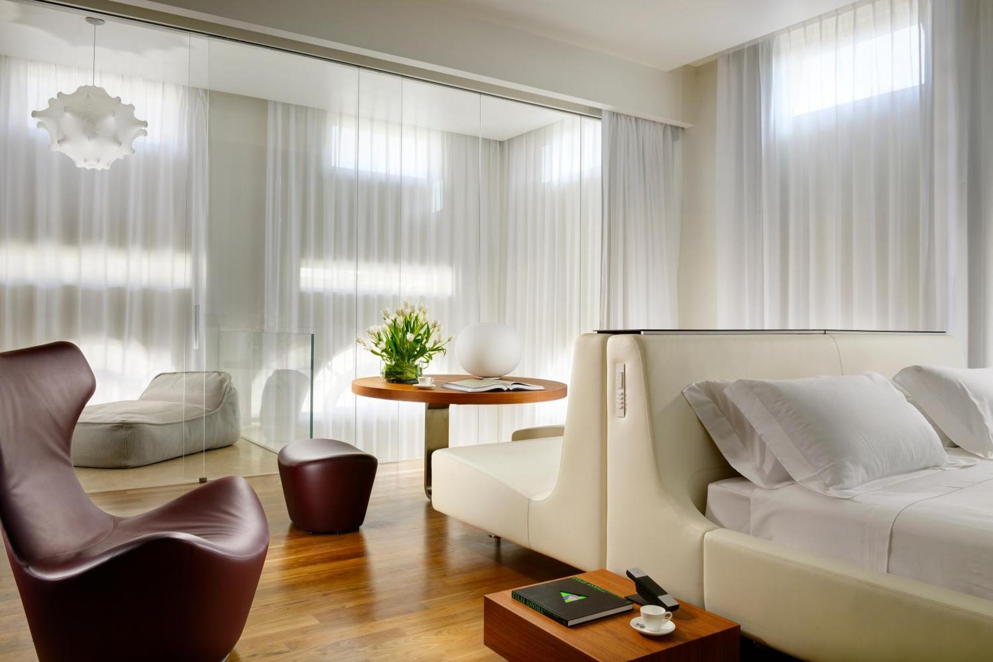 Palazzo Montemartini Rome, A Radisson Collection Hotel Exterior foto A room at the Mandarin Oriental, Munich