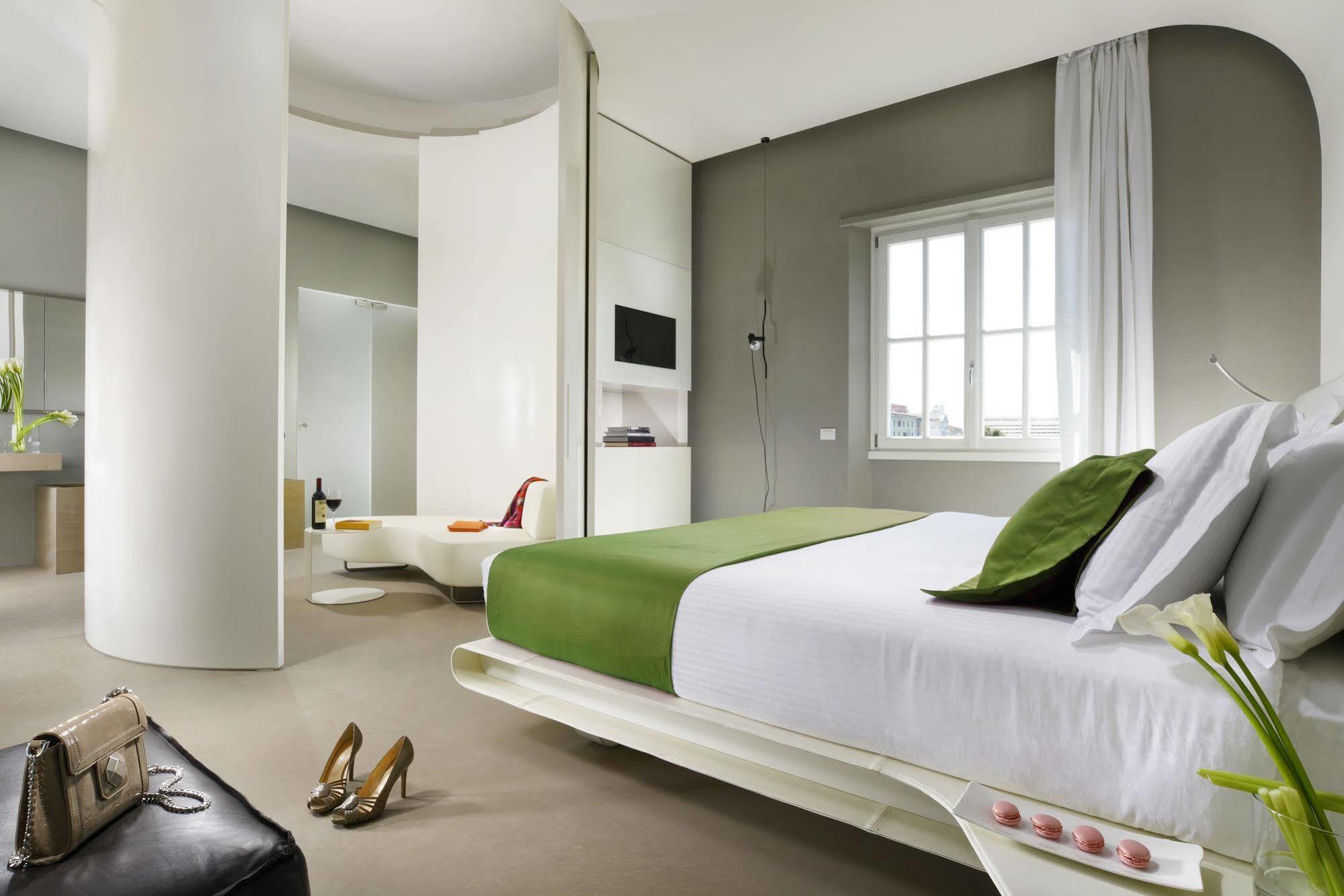 Palazzo Montemartini Rome, A Radisson Collection Hotel Exterior foto A bedroom at the hotel